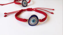 Load image into Gallery viewer, Blue evil eye in macramé
